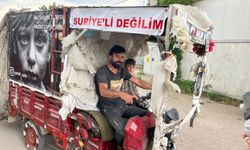 Suriyeli sanılmaktan korktu, motosikletine yazdı
