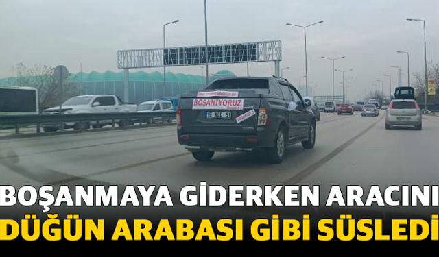 Boşanma davasına giderken aracını düğün arabası gibi süsledi