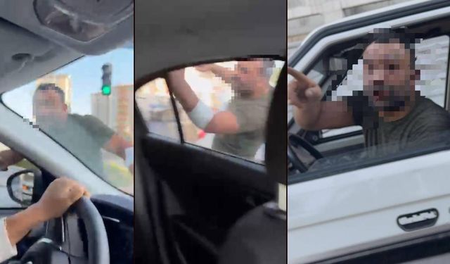 Trafikte dehşet saçtı! Tartıştığı kadınların otomobilini yumrukladı: Video haber…