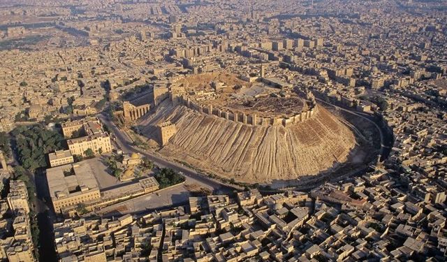 Halep'te kadın ve çocuk cesetlerinin bulunduğu toplu mezar bulundu