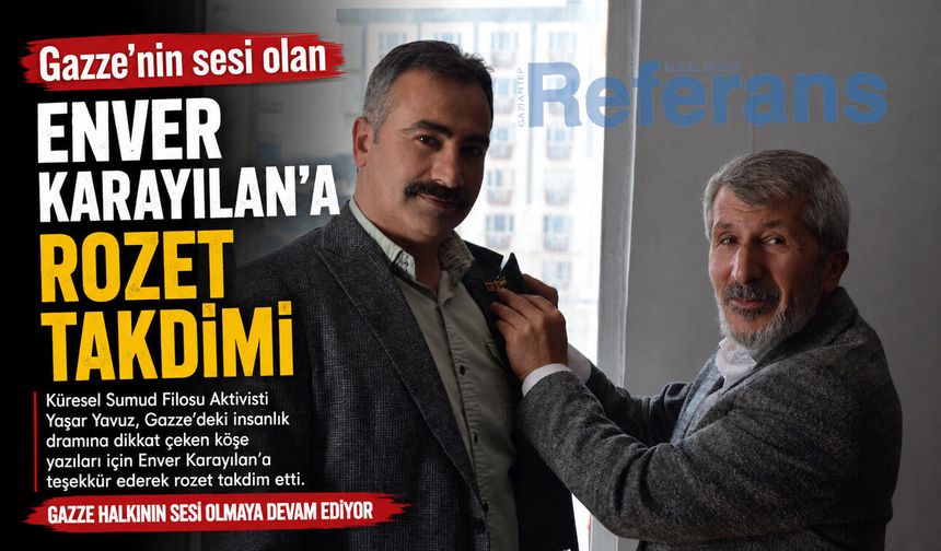 Gazze’nin sesi olan Enver Karayılan’a rozet takdimi